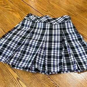 Parker purple/black pleated schoolgirl uniform skirt. Side zip. Size 2.